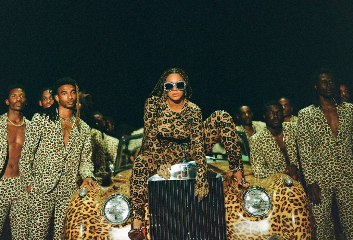 This image released by Disney Plus shows Beyonce Knowles, center, in a scene from her visual al ...