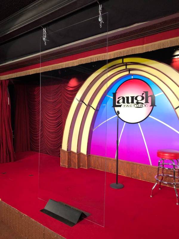 The stage at the Laugh Factory at the Tropicana, with a plexiglass barrier, as it is set for An ...