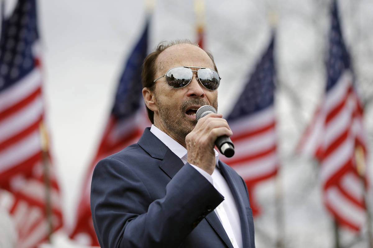 Country music singer Lee Greenwood performs at a rally for Republican presidential candidate Se ...