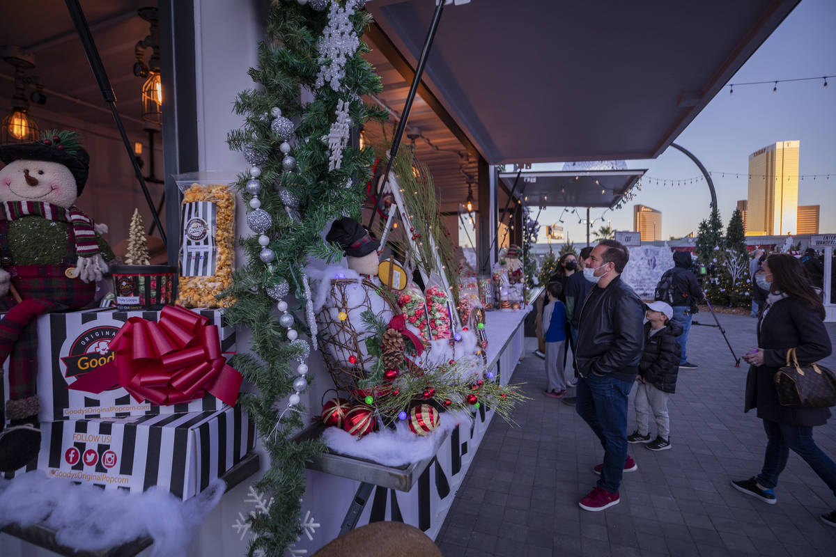 Individuals wait in line for hot chocolate and other concessions during the kick off of "Wander ...