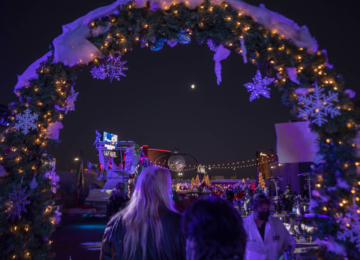 Individuals attend the kick off of "Wanderland" holiday experience at AREA15 on Friday, Nov. 27 ...