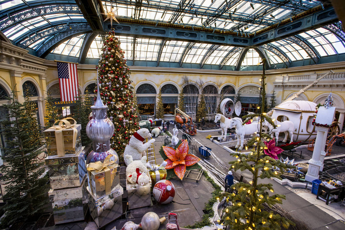 Construction continues about the new winter display "Hopeful Holidays" within the Bellagio Cons ...