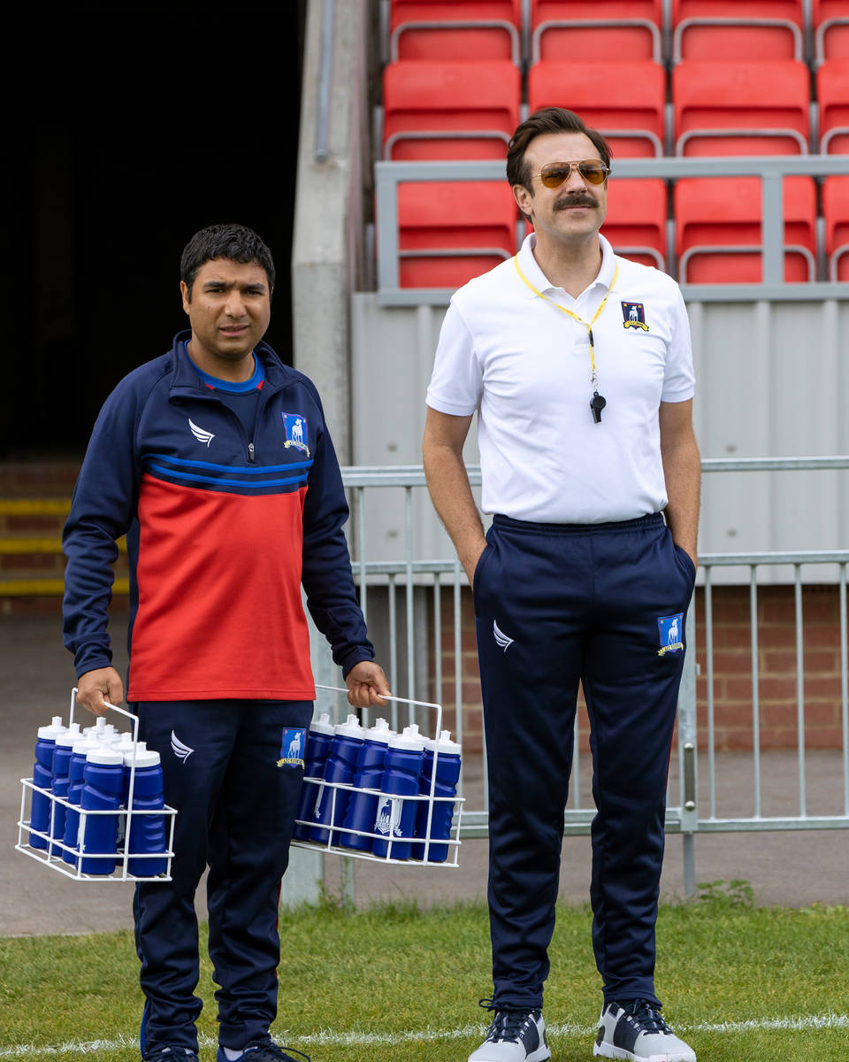 Nick Mohammed, left, and Jason Sudeikis star in “Ted Lasso.”​ (Apple TV+)