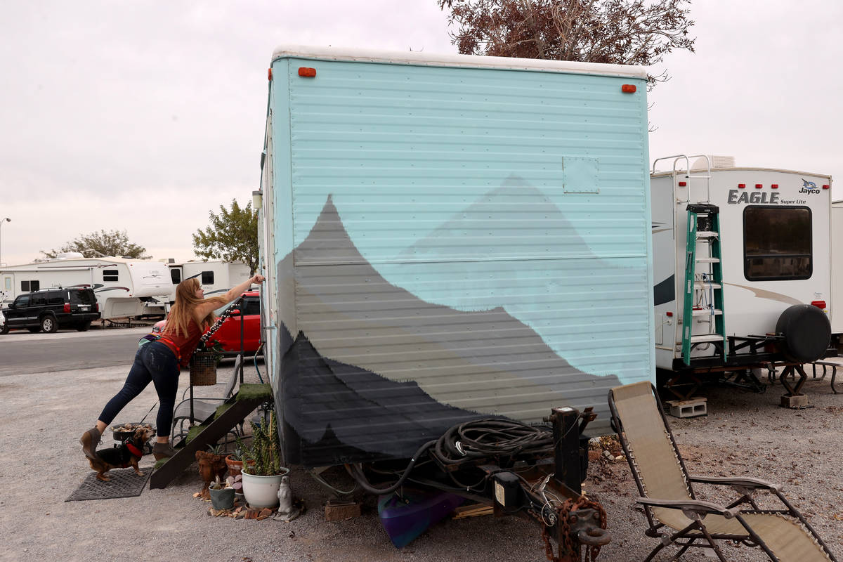Hannah Doss and her dog Banjo at their tiny home in Boulder City Friday, Dec. 11, 2020. Doss bo ...