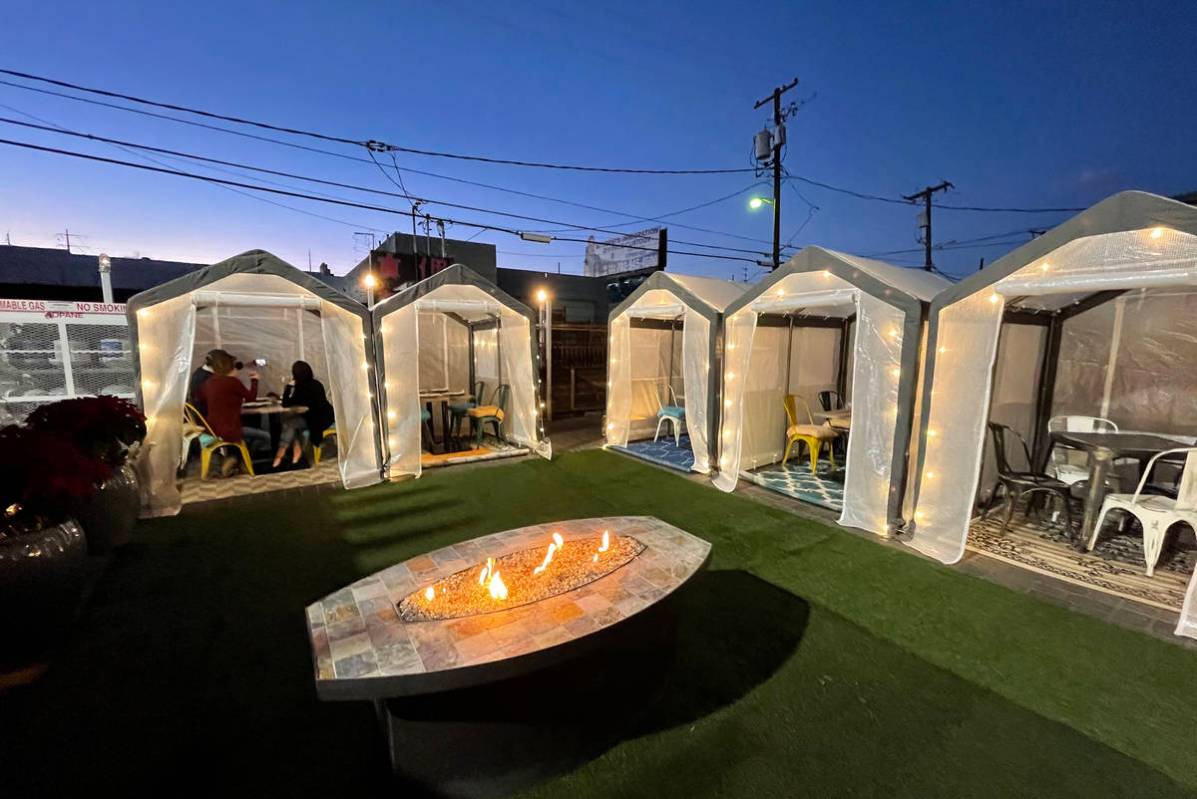 Outdoor individual dining tents at Esther's Kitchen in downtown Las Vegas restaurant Monday, De ...