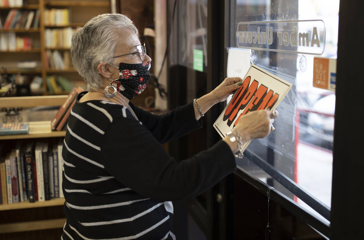 Myrna Donato, owner of Amber Unicorn Books, closes shop on the last business day at the Vegas l ...