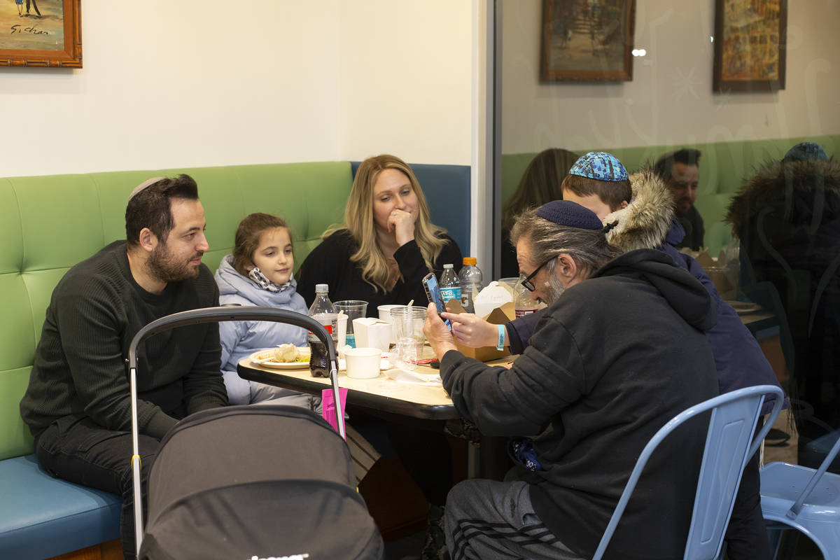 The Gottlieb family, of New York, enjoy a meal at Kosher Chinglish, sister restaurant of Chingl ...