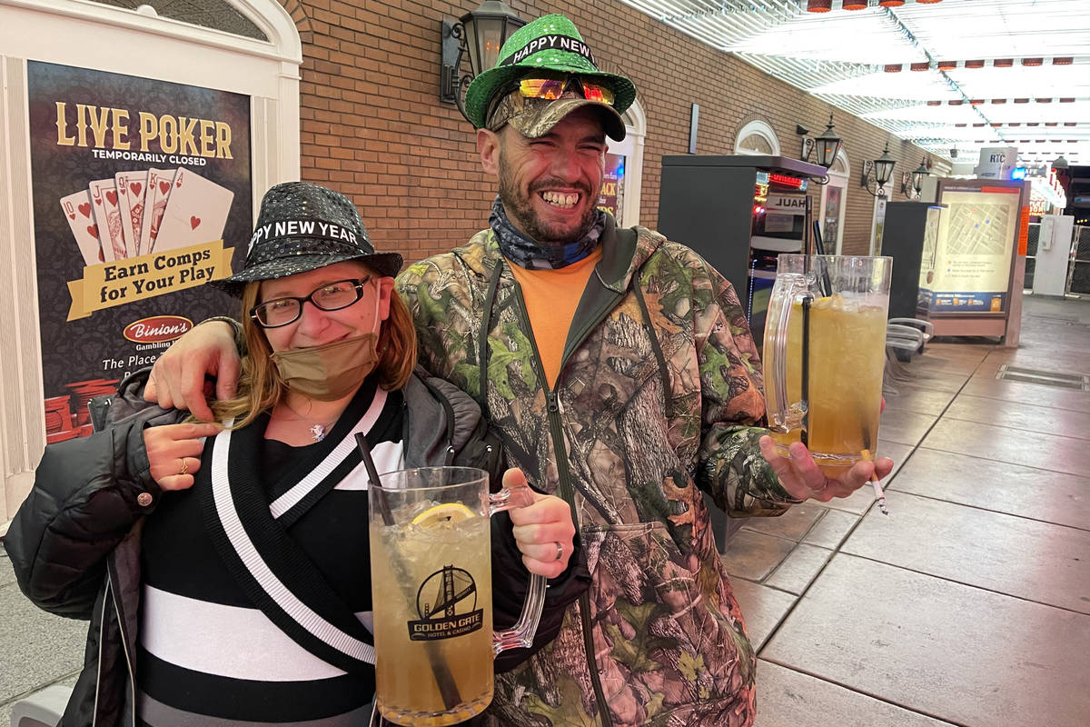 Josh and Emily Watson of Coffee, Tenn., who were married Wednesday night, celebrate New Year's ...