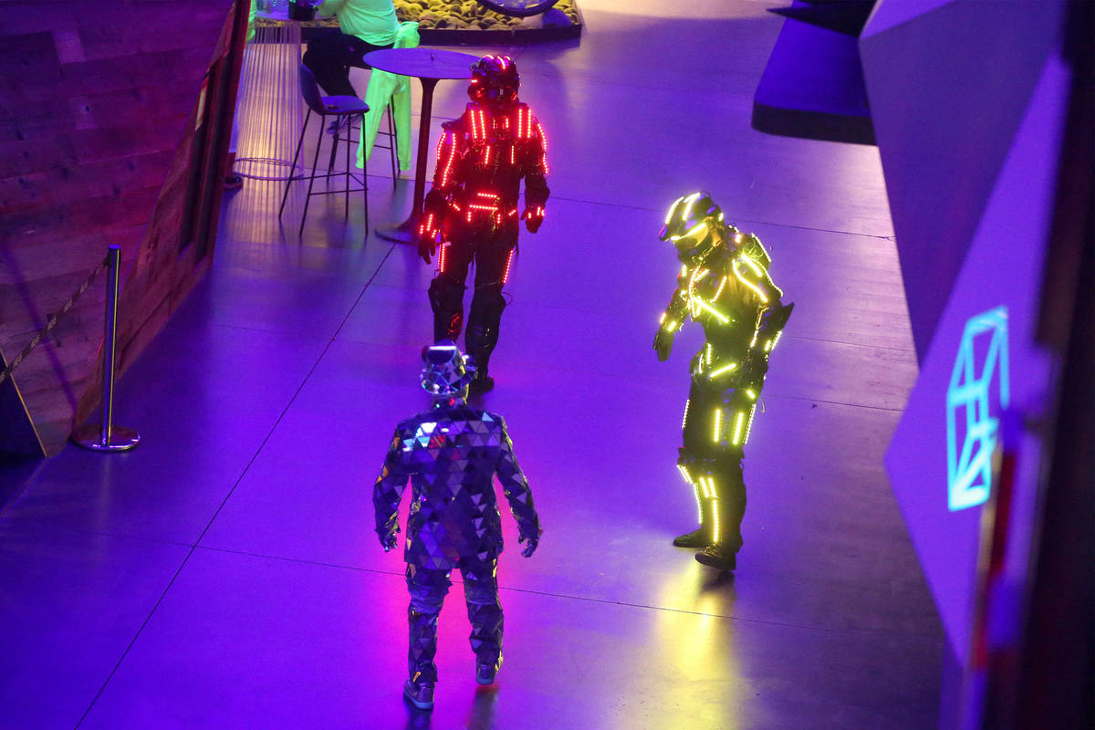 Performers dance during the "Illuminate" New Year’s Eve celebration at Area15 in Las Vegas on ...