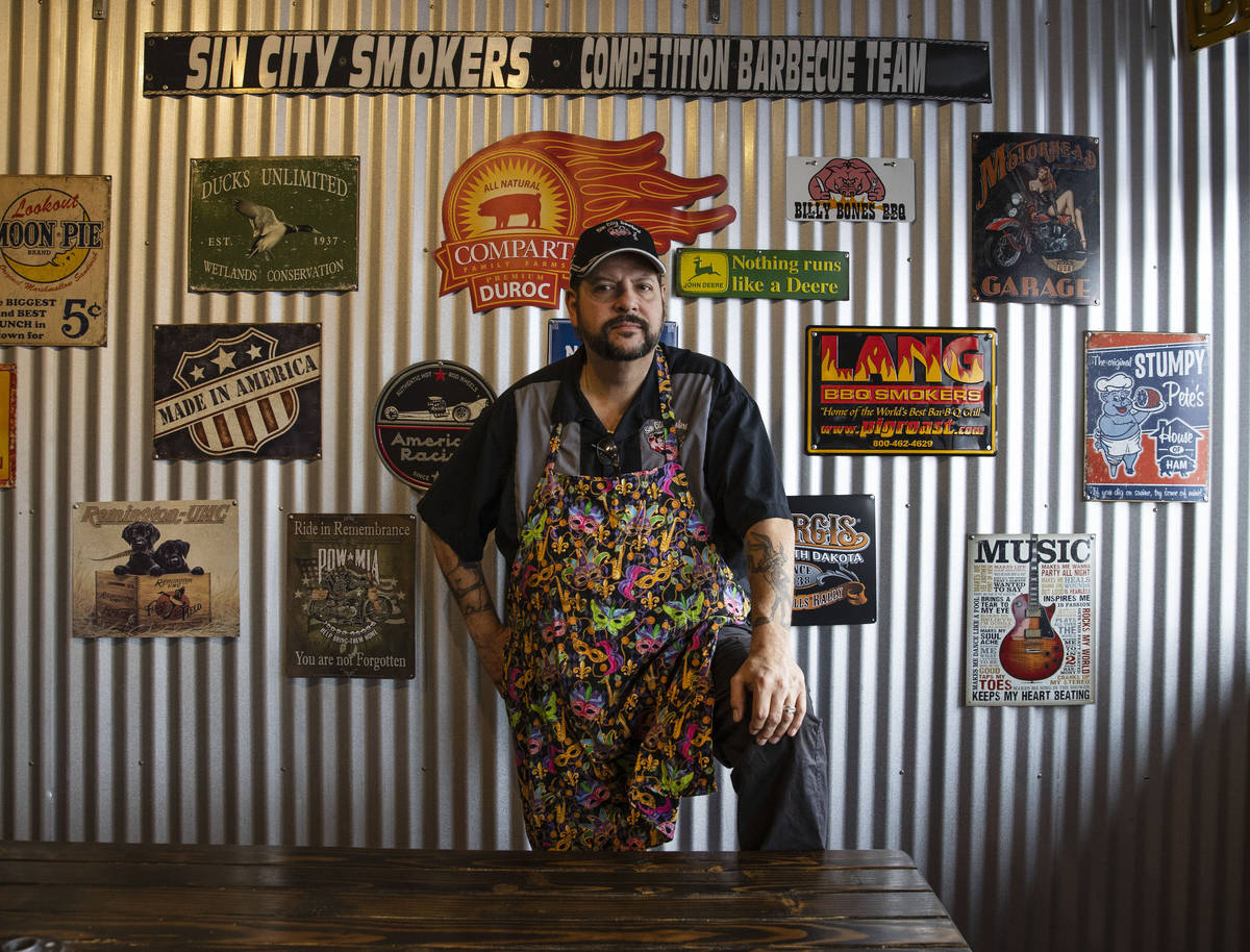 Steve Overlay, owner of Sin City Smokers Barbecue and Catering, poses for a photo at his Hender ...