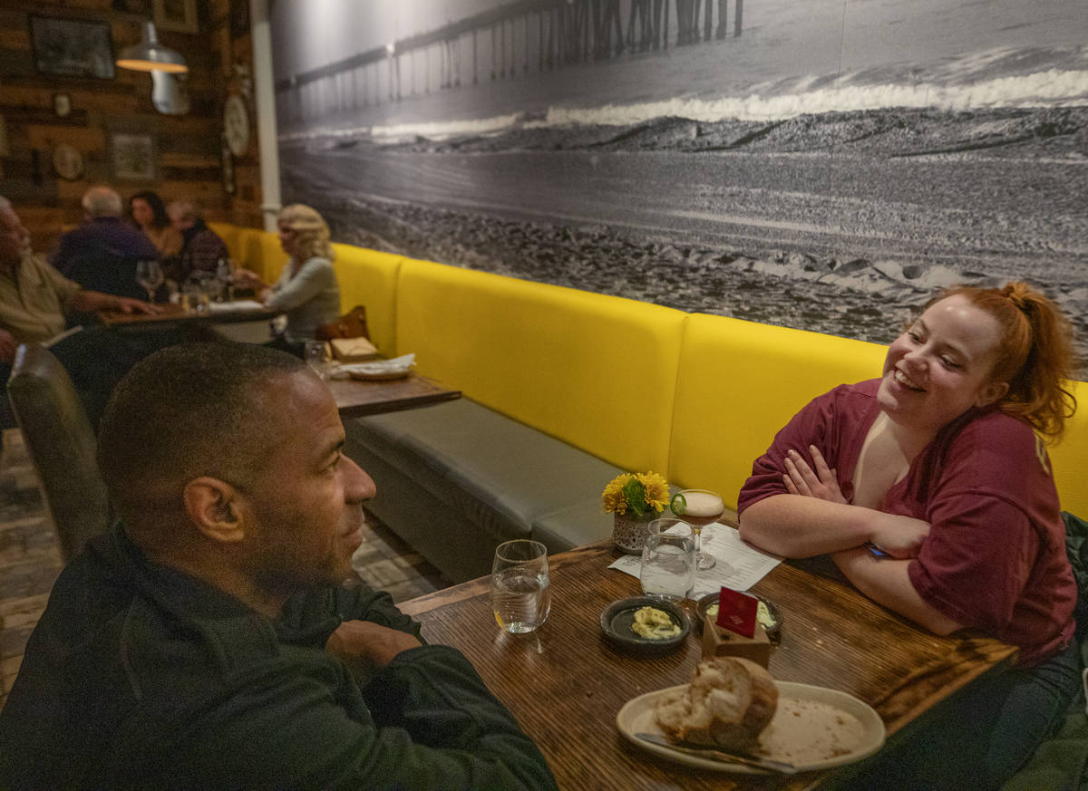 Ellis Brown, 43, of Atlanta, Georg., left, and Heather Snedeker, 30, of Las Vegas, dine at Esth ...
