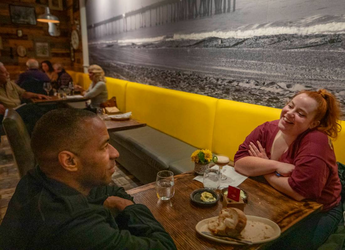 Ellis Brown, 43, of Atlanta, Georg., left, and Heather Snedeker, 30, of Las Vegas, dine at Esth ...