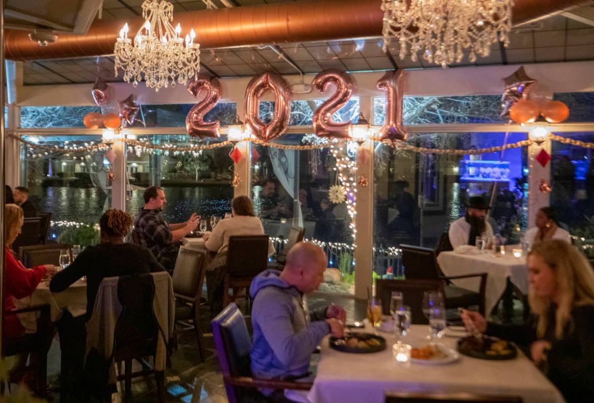 Individuals dine at Americana in Las Vegas on Thursday, Dec. 31, 2020. (Elizabeth Page Brumley/ ...