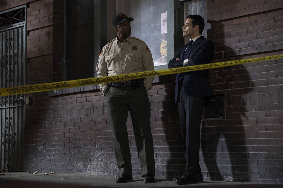 Denzel Washington stars as Joe “Deke” Deacon, left, with Rami Malek as Jim Baxter in the ne ...