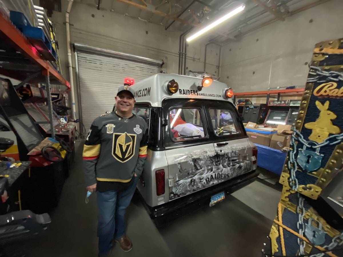 Diversion Amusements events and banquet facility owner Brad Burdsall is shown next to his Las V ...