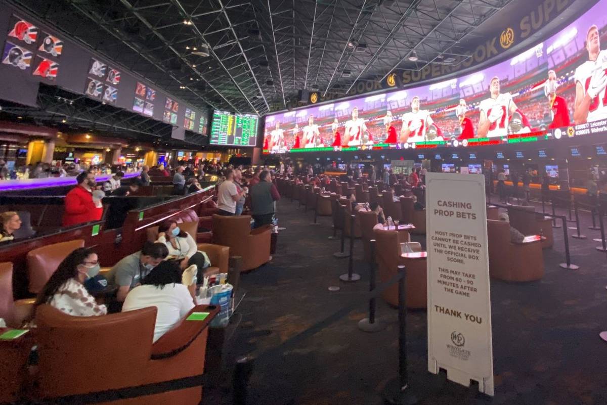 The Super Bowl LV scene at Westgate Las Vegas' SuperBook is shown on Sunday, Feb. 7, 2021. (Joh ...
