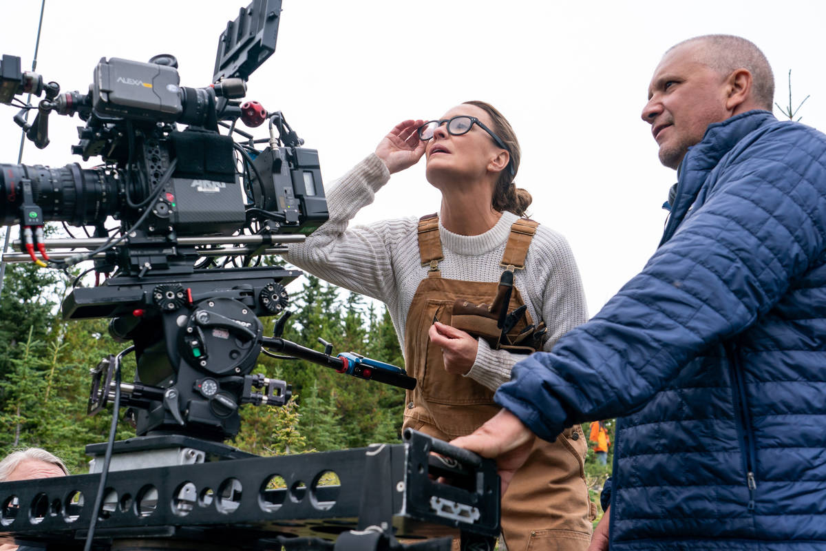 Director and actor Robin Wright with director of photography Bobby Bukowski on the set of "Land ...