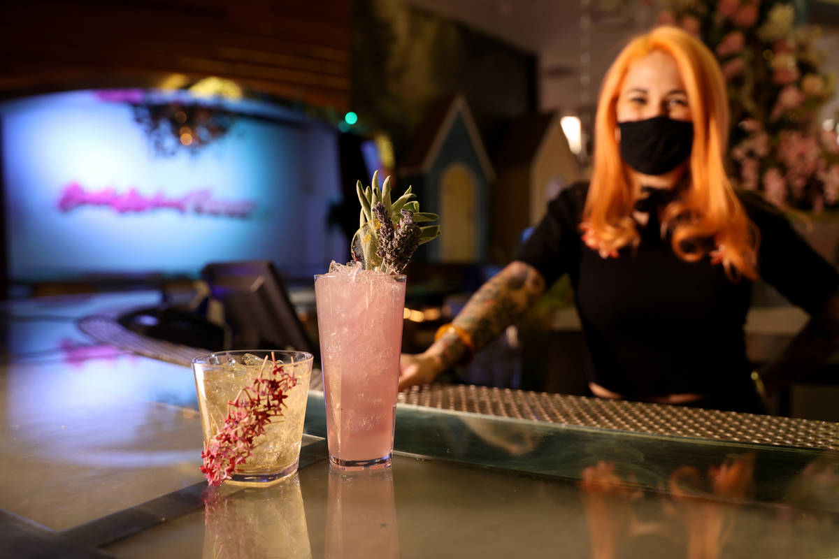 Key Account Mixologist Chelsea Caplin serves up a Tiger Lily, left, and Lavender at seasonal po ...