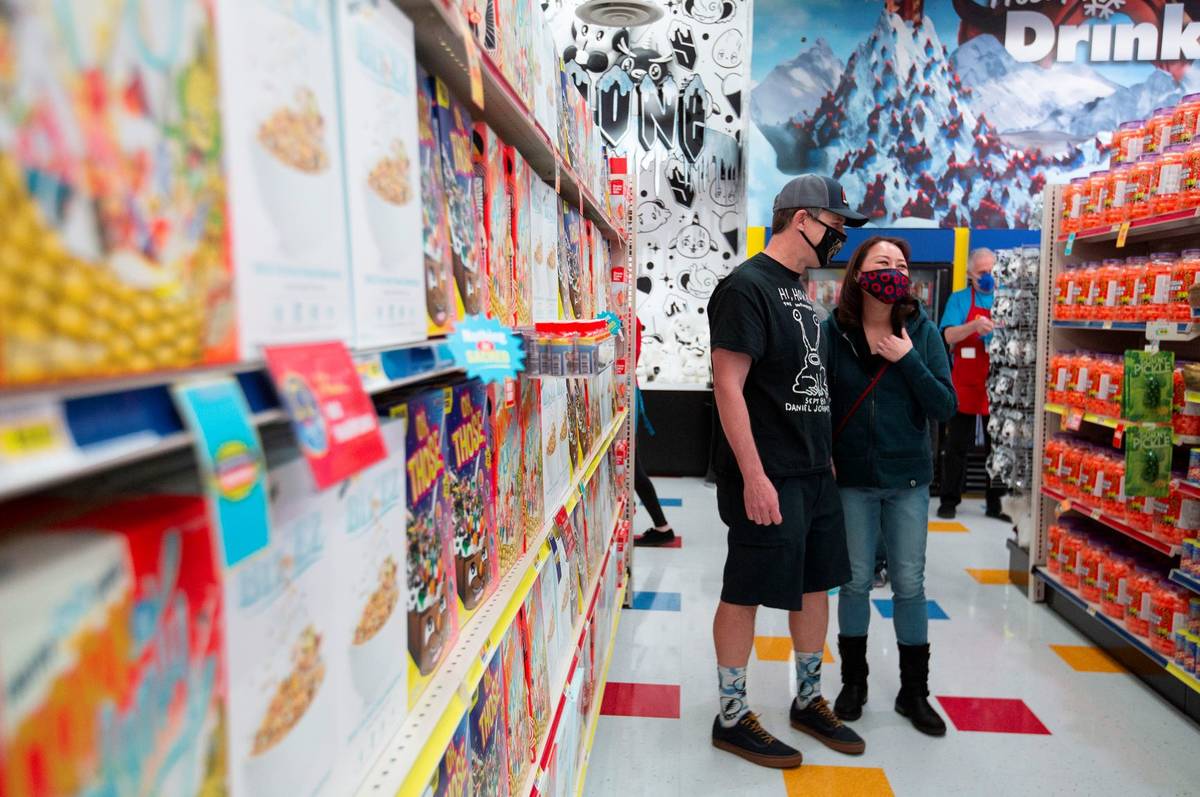 Brian Rogers and Sue Roh laugh at the comedically titled products for sale on opening day at th ...