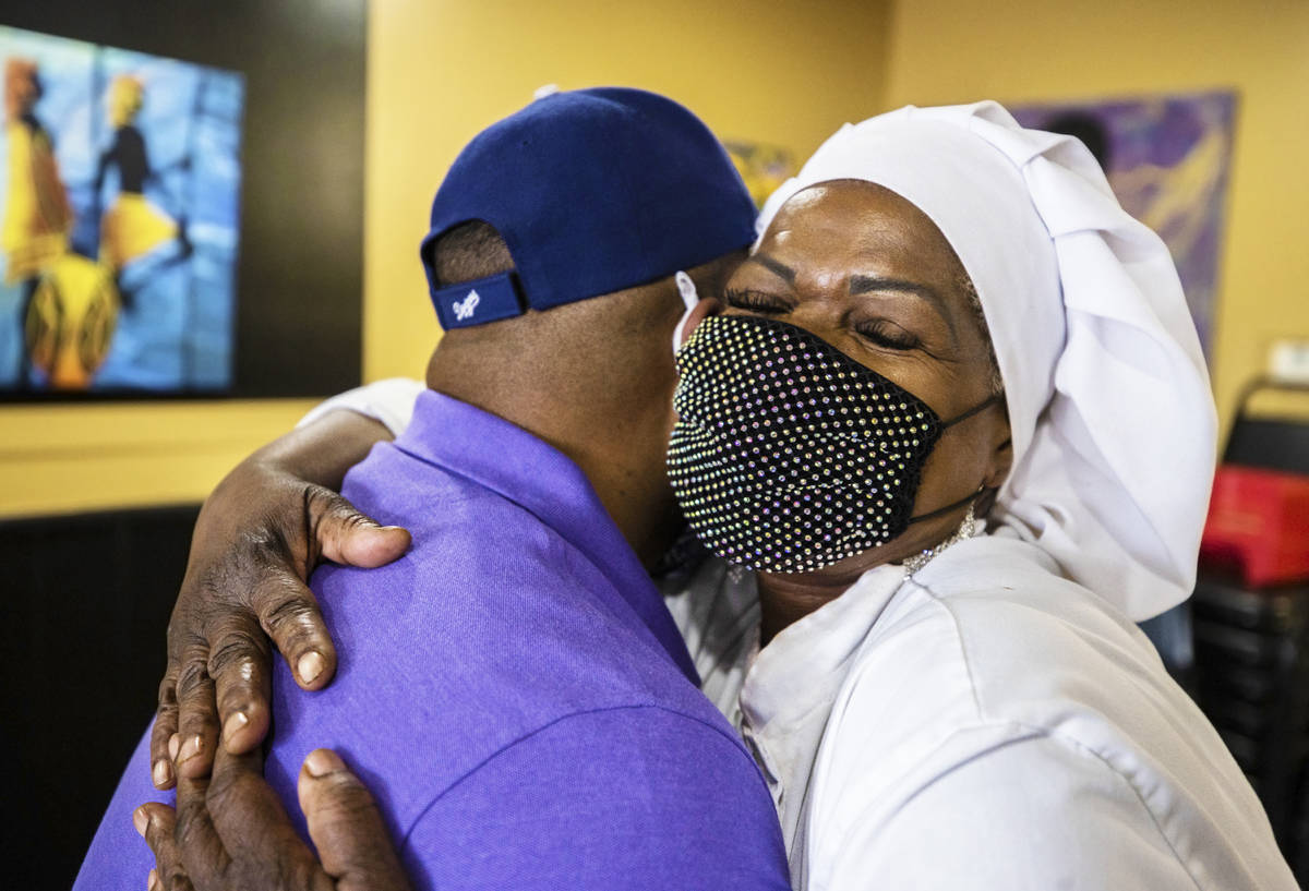 Chef Carol Hampton-Gray greets a customer with a hug at Chef Carol's Southern Kitchen in Las Ve ...