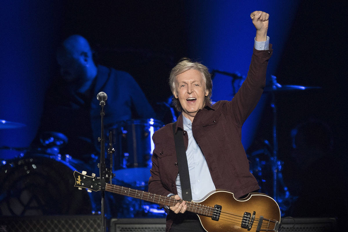 FILE - Paul McCartney performs in Quebec City on Sept. 17, 2018. McCartney's memoir, “Th ...