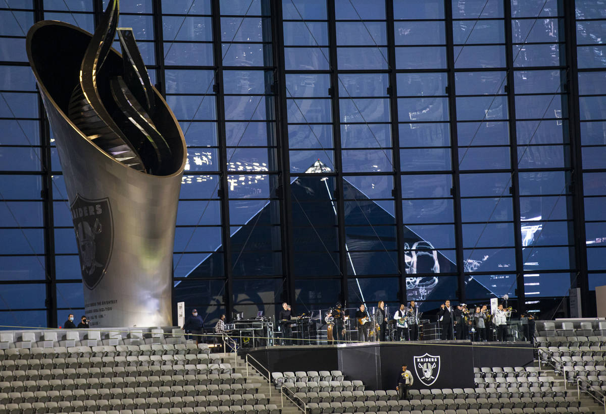 Members of Santa Fe & The Fat City Horns perform at Allegiant Stadium in Las Vegas on Sunda ...