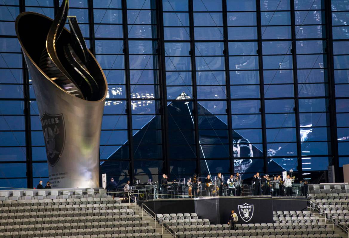 Members of Santa Fe & The Fat City Horns perform at Allegiant Stadium in Las Vegas on Sunda ...