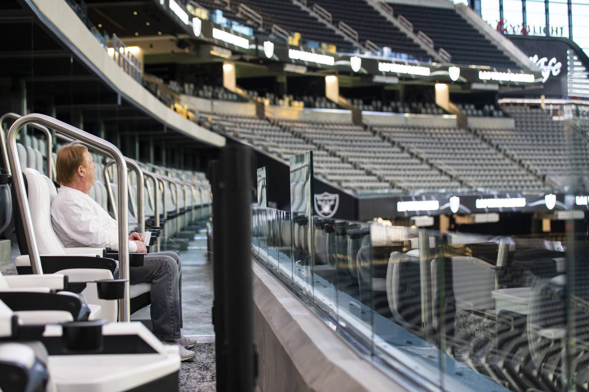 Mark Davis, owner of the Las Vegas Raiders, watches as members of Santa Fe & The Fat City H ...