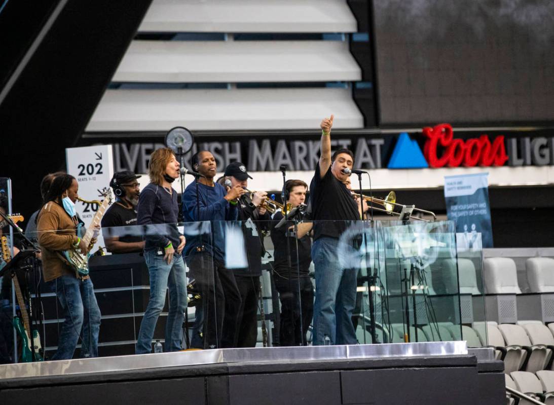Members of Santa Fe & The Fat City Horns perform during soundcheck at Allegiant Stadium in ...