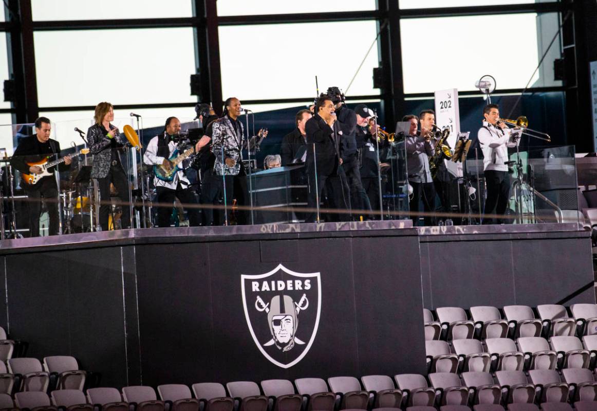 Members of Santa Fe & The Fat City Horns perform at Allegiant Stadium in Las Vegas on Sunda ...