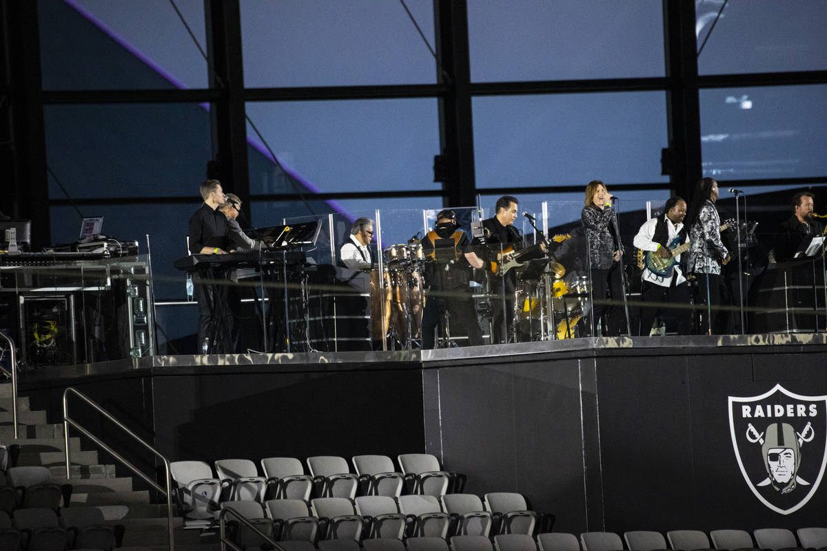 Members of Santa Fe & The Fat City Horns perform at Allegiant Stadium in Las Vegas on Sunda ...