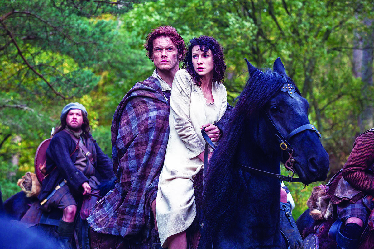 Caitriona Balfe and Sam Heughan in "Outlander," premiering Saturday. Despite its pulp ...