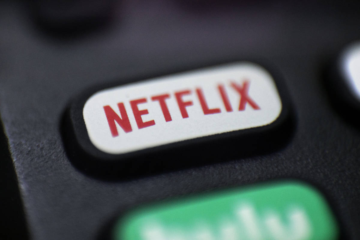 FAn Aug. 13, 2020, file photo shows a logo for Netflix on a remote control in Portland, Ore. Ne ...