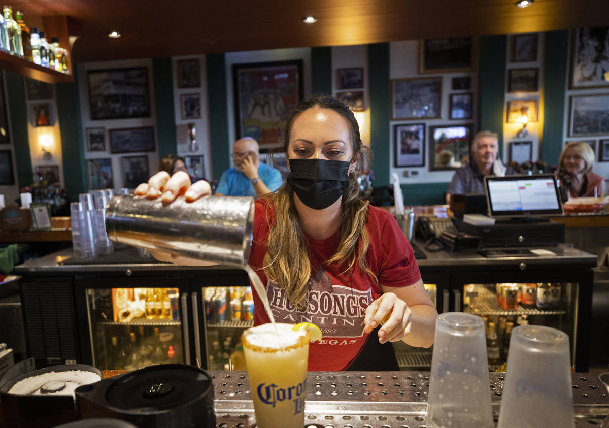 Bartender Elizabeth Blanke pours a drink at Hussong's Cantina Boca Park on March 19, in Las Veg ...