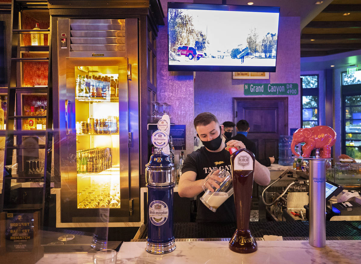 Drink orders are filled during dinner at Tailgate Social on Friday at Palace Station in Las Veg ...