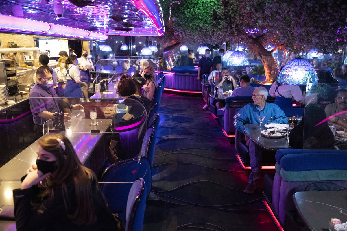 People dine at Peppermill Las Vegas restaurant in Las Vegas Friday night. (Erik Verduzco / Las ...