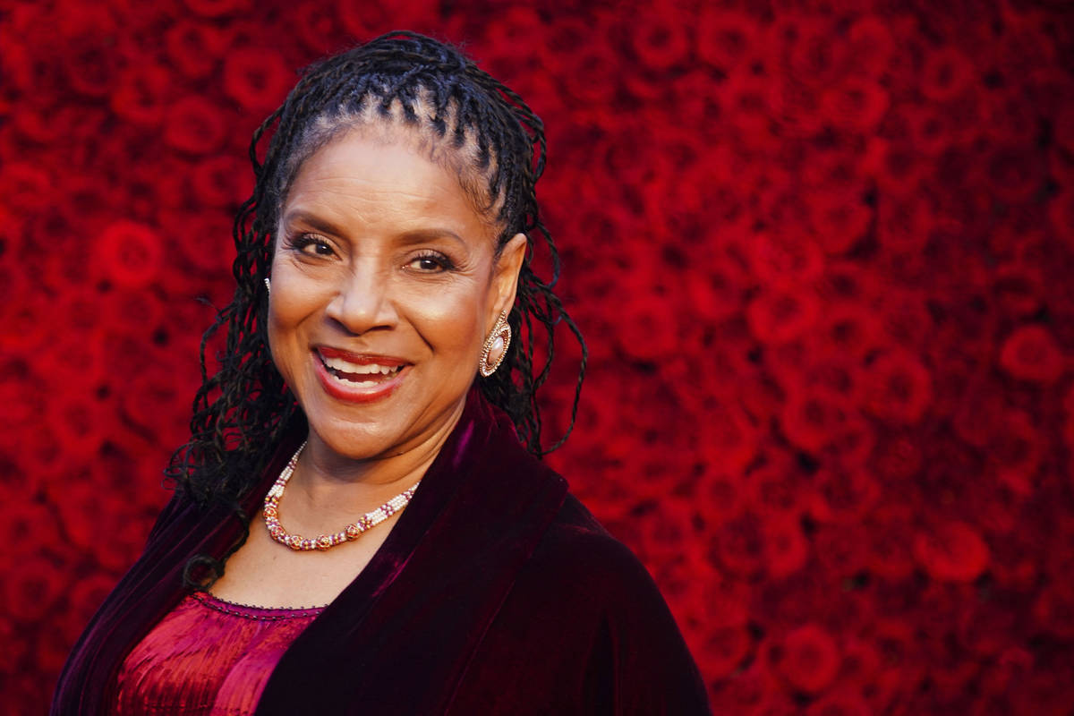 Phylicia Rashad poses for a photo on the red carpet at the grand opening of Tyler Perry Studios ...