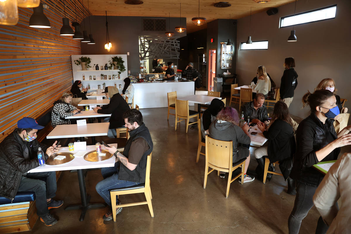 People dine at Vegas Test Kitchen in Las Vegas. (Erik Verduzco/Las Vegas Review-Journal) @Erik_ ...