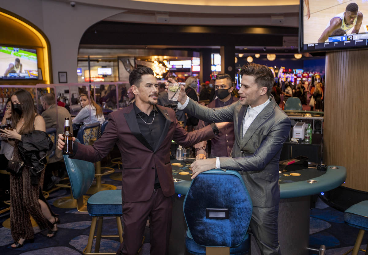 Tom Sandoval, left, and Tom Schwartz, both with Vanderpump Rules celebrate with a drink in the ...