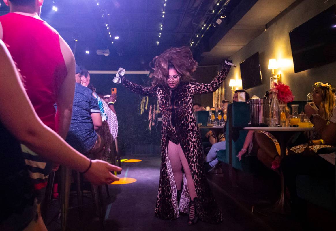 Drag queen Des'ree D. St. James performs during the "Bottomless Drag Brunch" show at ...