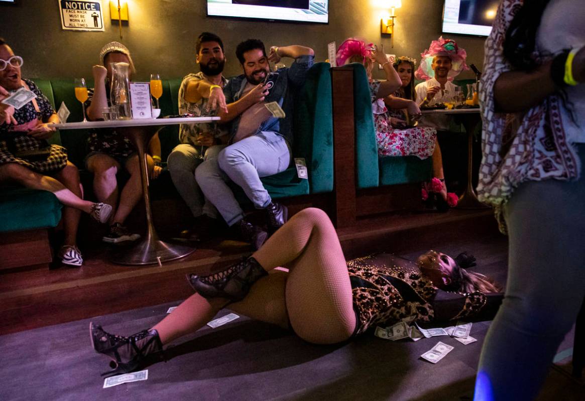 Drag queen Des'ree D. St. James performs during the "Bottomless Drag Brunch" show at ...