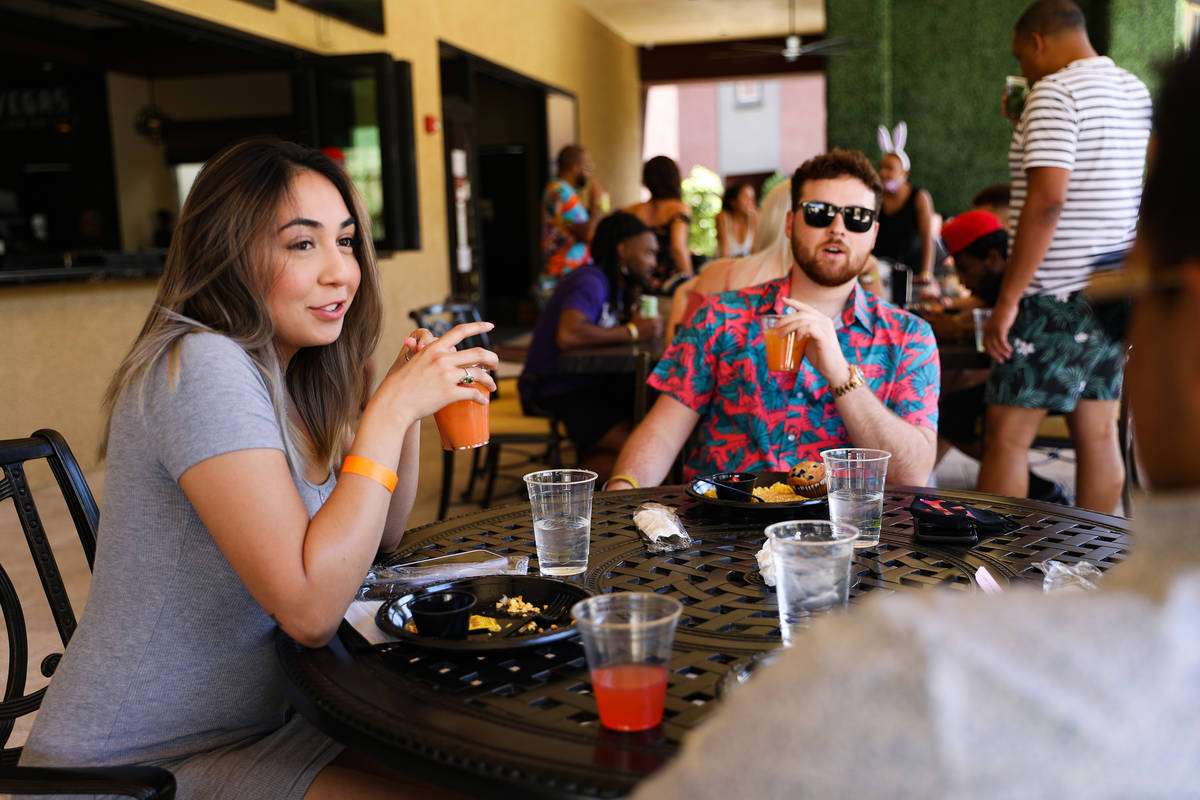 Ashley May has brunch with friends Noah Eyman, center, and Devon Huff at Becca's Restaurant & L ...