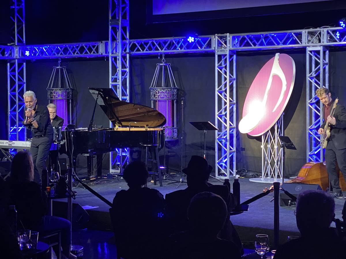 Clint Holmes performs with Tom Schuman, far left, and Dave Ostrem at Notoriety at Neonopolis on ...