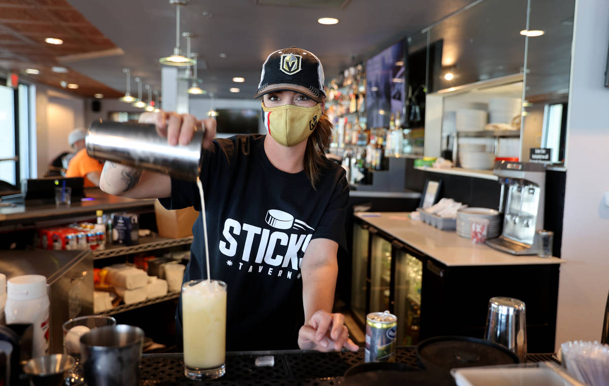 Bartender Virginia Douglass makes a Chance's Colada with rum, coconut, pineapple, lime and oran ...