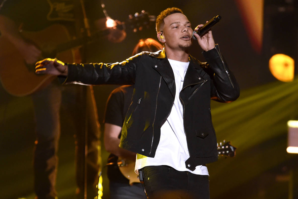 In this Nov. 8, 2017, file photo, Kane Brown performs "Heaven South" at the 51st annual CMA Awa ...