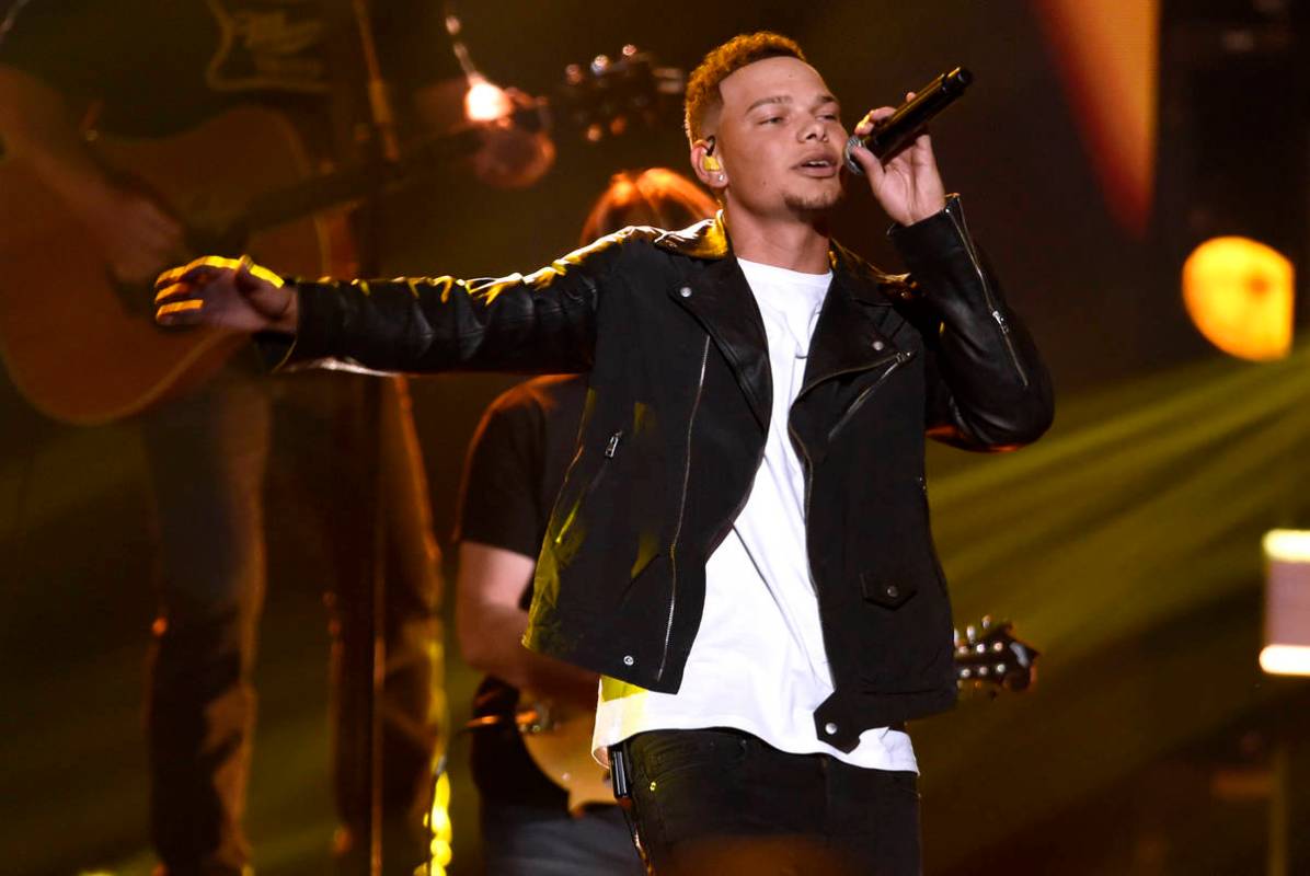 In this Nov. 8, 2017, file photo, Kane Brown performs "Heaven South" at the 51st annual CMA Awa ...