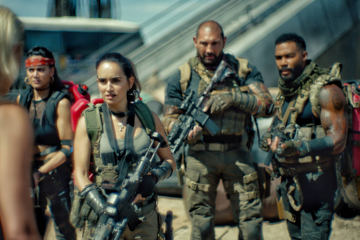 From left, Nora Arnezeder, Samantha Win, Ana De La Reguera, Dave Bautista and Omari Hardwick st ...