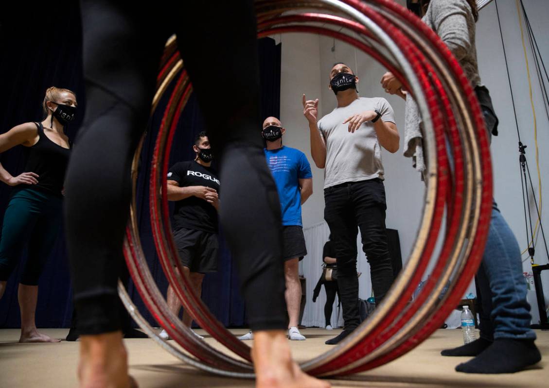 Brandon Pereyda, second from right, leads a meeting during rehearsal for "Ignite" at Nevada Rhy ...
