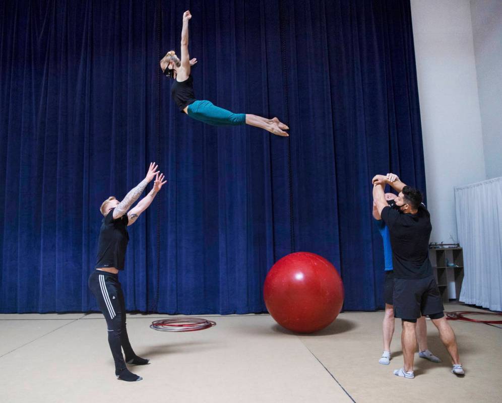 Banquine acrobats Barnaby Llewellyn, left, Kerren McKeeman, Adam Laughton and Adam Denny rehear ...