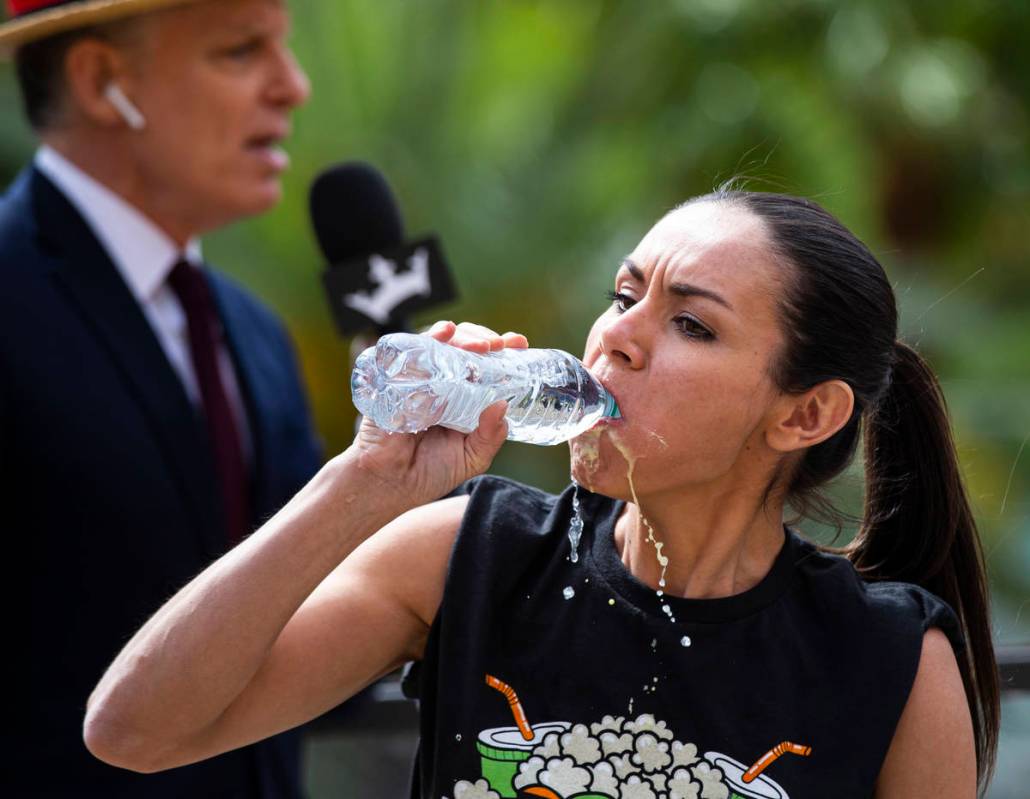Michelle Lesco competes to eat 50 hard boiled eggs in the "Red Carpet Film Feast" eat ...